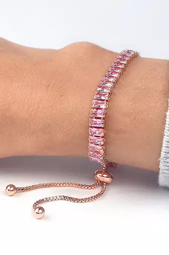 Rose gold plated pink baguette stone studded adjustable charm bracelet jewellery for women