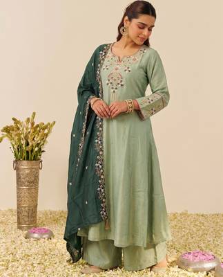 Women's silk blend pista embroidered kurta set with palazzo and dupatta 4