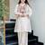 Women's cream embroidered straight crepe kurta with pant