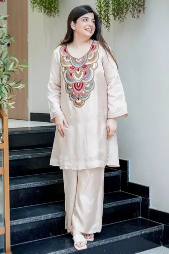 Women's cream embroidered straight crepe kurta with pant