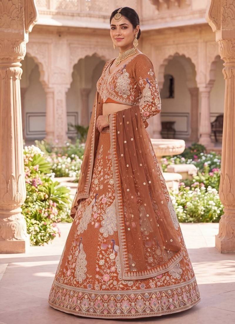 Rust Orange Silk Bridal Lehenga Choli With Heritage Dori And Peacock Embroidery