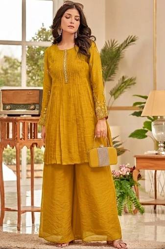 Women Ethnic Motifs Embroidered Pleated Thread Work Kurti with Palazzos