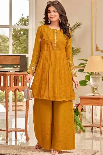 Women Ethnic Motifs Embroidered Pleated Thread Work Kurti with Palazzos