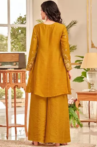 Women Ethnic Motifs Embroidered Pleated Thread Work Kurti with Palazzos