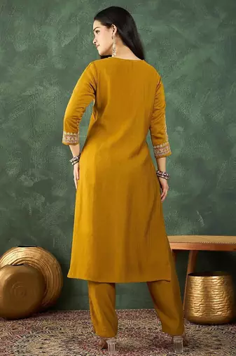 Women Ethnic Motifs Embroidered Kurta with Trousers