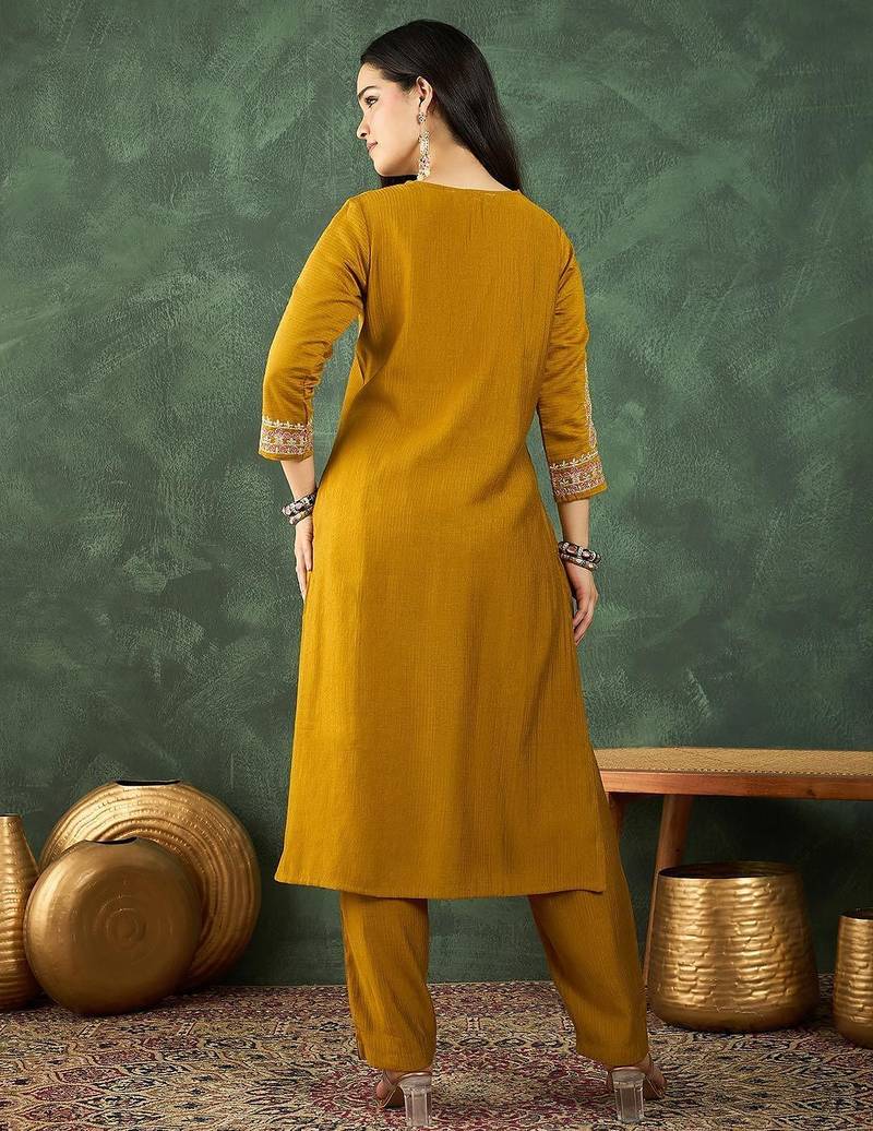 Women Ethnic Motifs Embroidered Kurta with Trousers