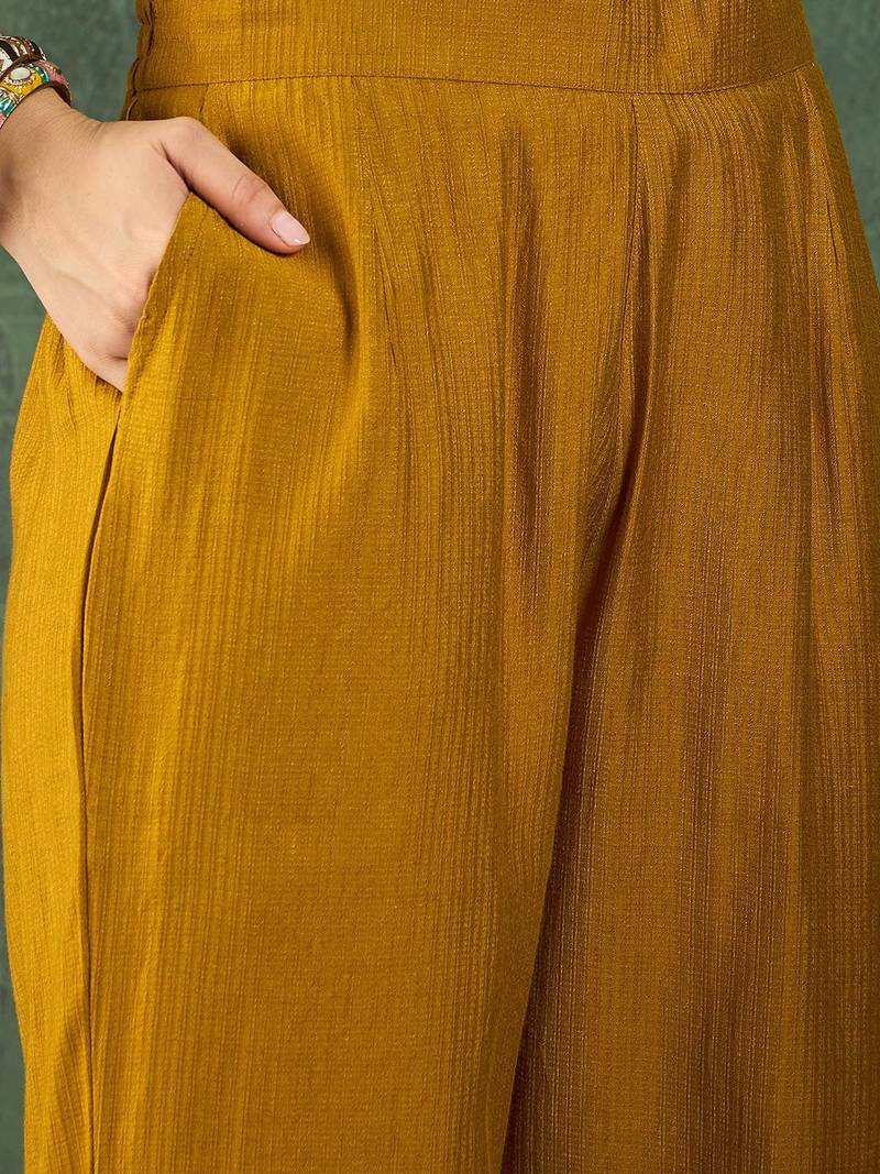 Women Ethnic Motifs Embroidered Kurta with Trousers
