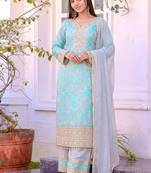 Blue faux georgette embroidered palazzo suit with rivet moti dupatta