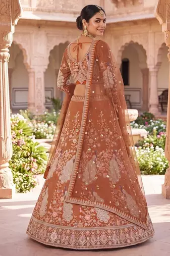 Rust Orange Silk Bridal Lehenga Choli With Heritage Dori And Peacock Embroidery