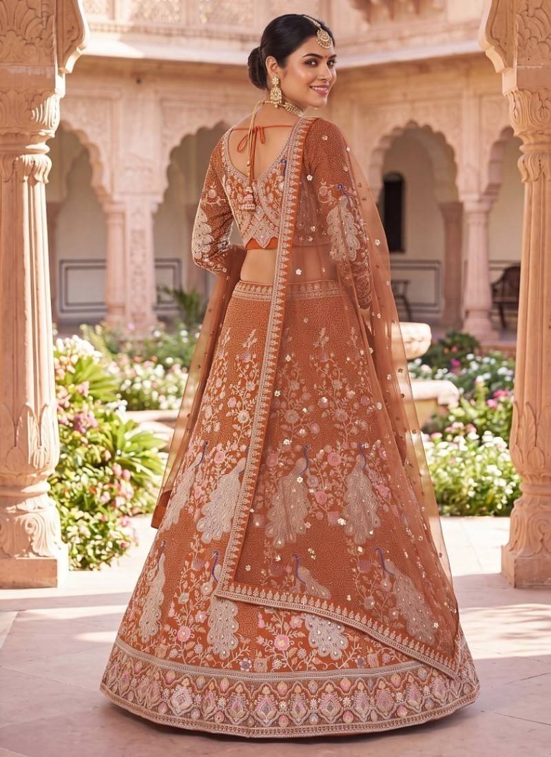 Rust Orange Silk Bridal Lehenga Choli With Heritage Dori And Peacock Embroidery