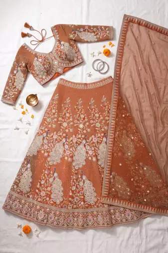 Rust Orange Silk Bridal Lehenga Choli With Heritage Dori And Peacock Embroidery