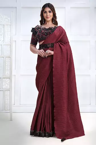 Maroon faux crepe silk georgette saree with embroidered blouse