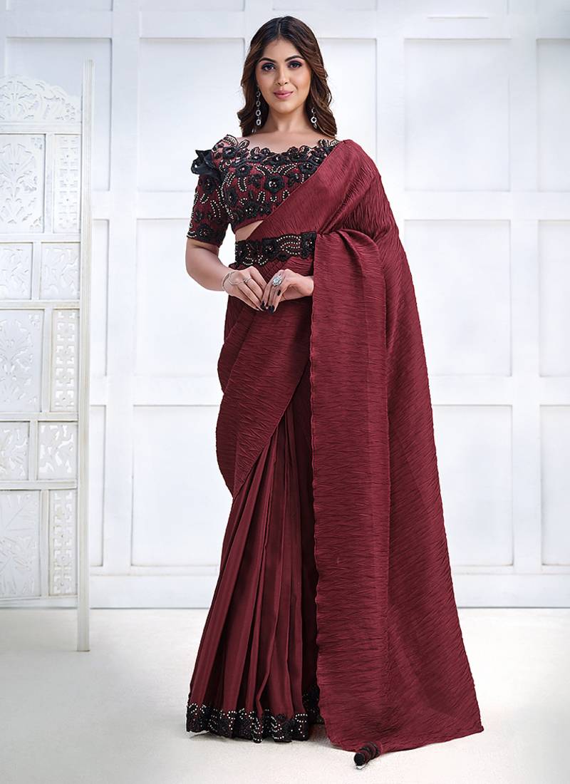 Maroon faux crepe silk georgette saree with embroidered blouse