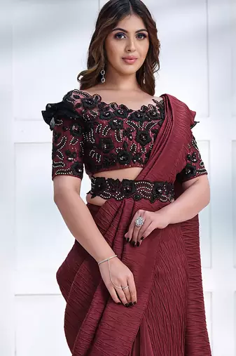 Maroon faux crepe silk georgette saree with embroidered blouse