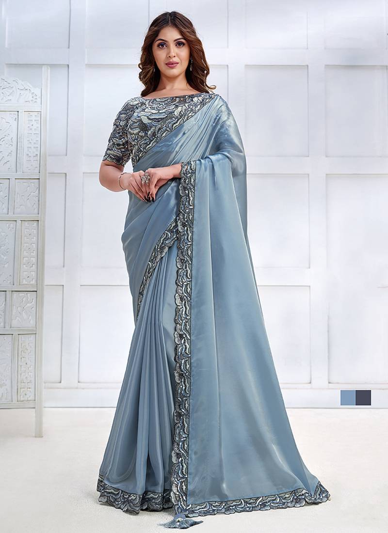 Ice blue faux crepe satin silk saree with embroidered blouse