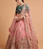 Peach And Green Stitched Lehenga Choli With Mirror And Embroidered Designs