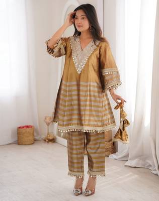 gold two tone line tissue silk coding embroidered mirror work lace kurta straight pant set 1