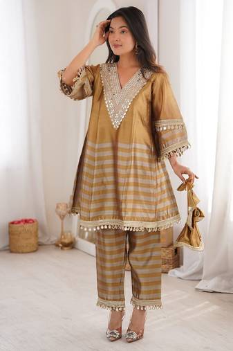gold two tone line tissue silk coding embroidered mirror work lace kurta straight pant set