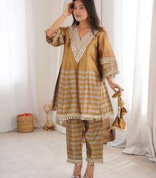 gold two tone line tissue silk coding embroidered mirror work lace kurta straight pant set
