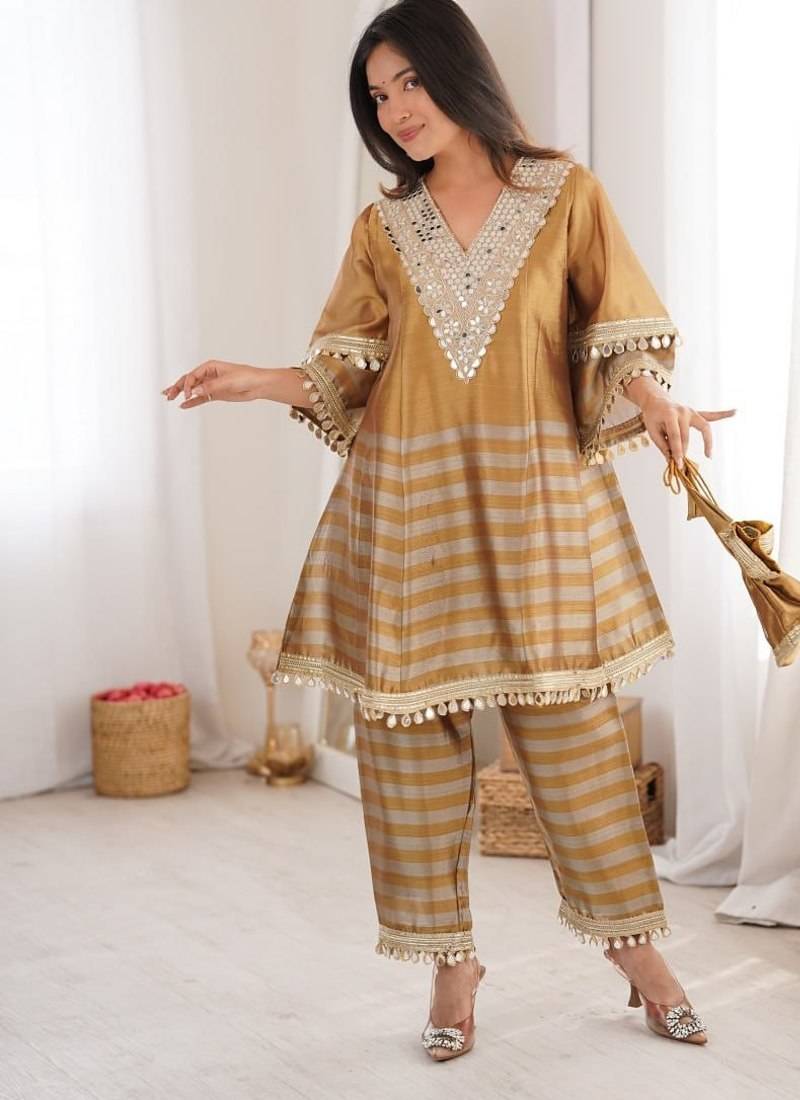 gold two tone line tissue silk coding embroidered mirror work lace kurta straight pant set