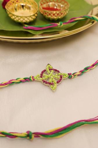 multicolor floral handcrafted beaded thread rakhi with roli chawal capsules