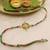 multicolor floral handcrafted beaded thread rakhi with roli chawal capsules