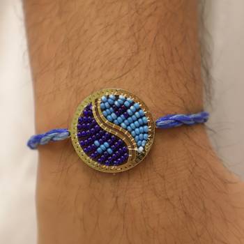 blue yin yang dual tone braided thread rakhi with roli chawal capsules 2