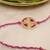  pink geometric beaded designer thread rakhi with roli chawal capsules