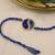 blue yin yang dual tone braided thread rakhi with roli chawal capsules