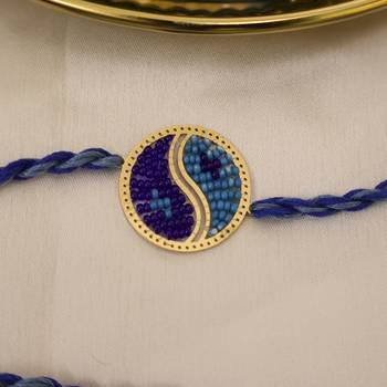 blue yin yang dual tone braided thread rakhi with roli chawal capsules 4
