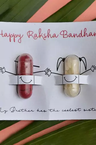 multicolor floral handcrafted beaded thread rakhi with roli chawal capsules