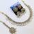 White antique-plated agate stone necklace set with earrings & maang tikka