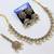 gold color champagne antique-plated agate stone necklace set with earrings & maang tikka