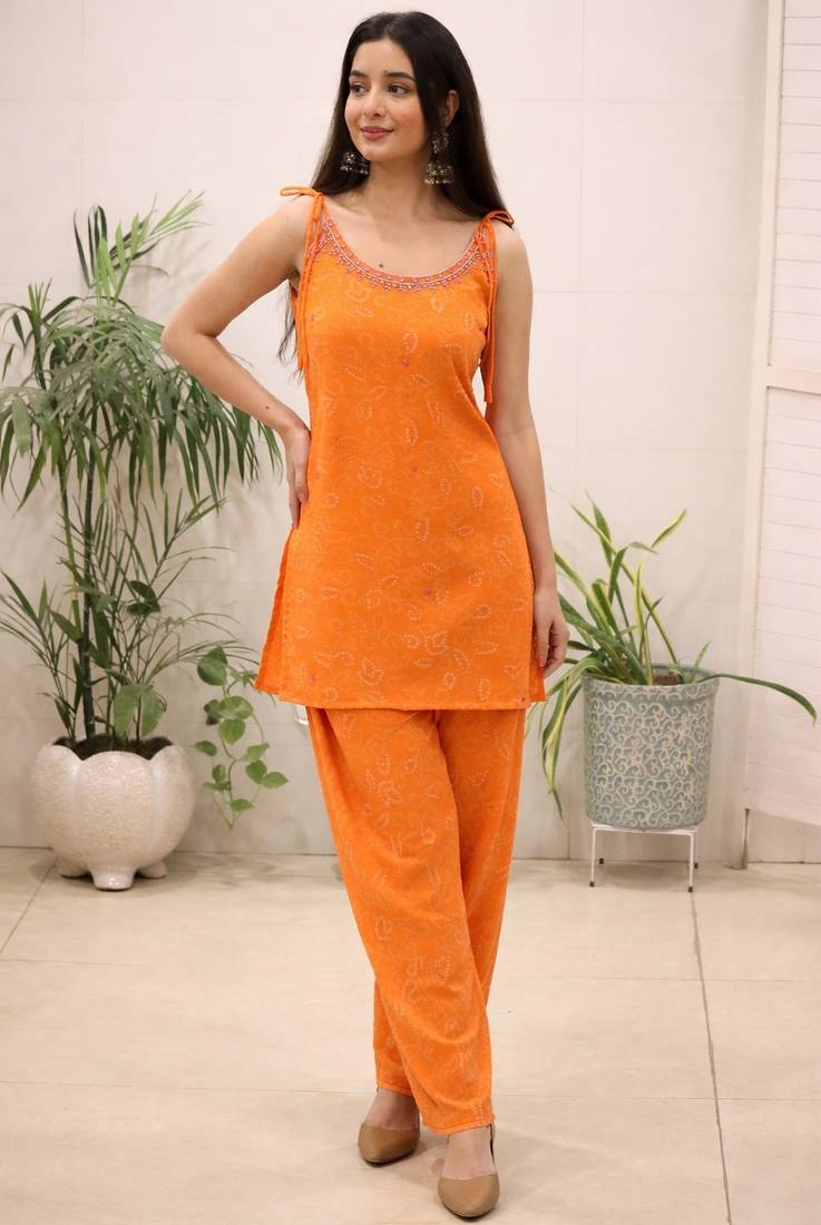 Orange mirror work kurti pant set