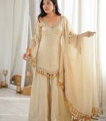 Golden-beige silk blend sharara suit with v-neck and tassels