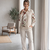 Women cream embroidered shirt and trousers co-ord set