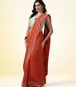 Rust orange ajrakh printed cotton saree