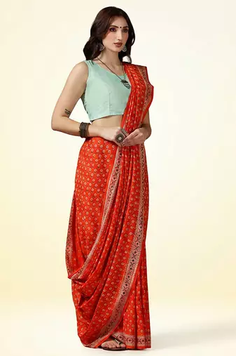 Rust orange ajrakh printed cotton saree
