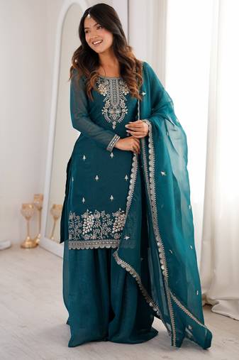 teal blue silk blend zari embroidered sequins palazzo suit festive wear