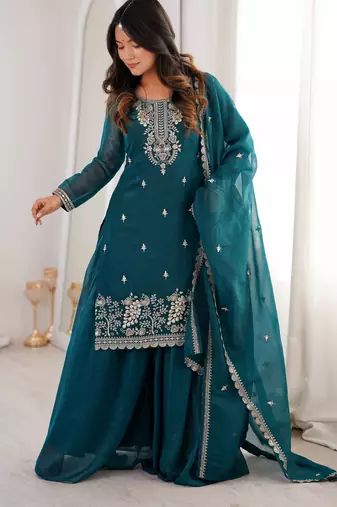 teal blue silk blend zari embroidered sequins palazzo suit festive wear
