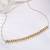 Gold plated faux ruby faux emerald studded ethnic belly chain kamarbandh jewellery for women
