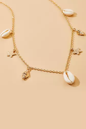 Gold plated sea shell star tassel waist belly chain fancy kamarbandh belt jewellery for women