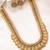 Gold plated faux ruby faux emerald studded long necklace earrings set jewellery for women