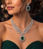 emerald green crystal geometric jewellery set, silver statement necklace earrings
