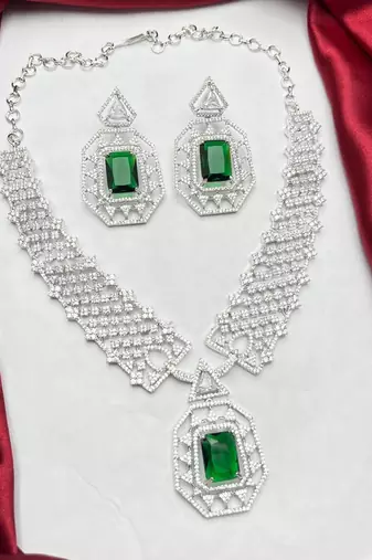 emerald green crystal geometric jewellery set, silver statement necklace earrings