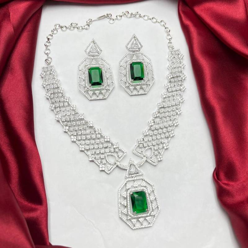 emerald green crystal geometric jewellery set, silver statement necklace earrings