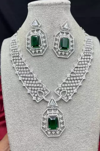 emerald green crystal geometric jewellery set, silver statement necklace earrings