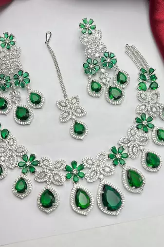 emerald green bridal jewellery set â€“ silver toned necklace, chandelier earrings, maang tikka