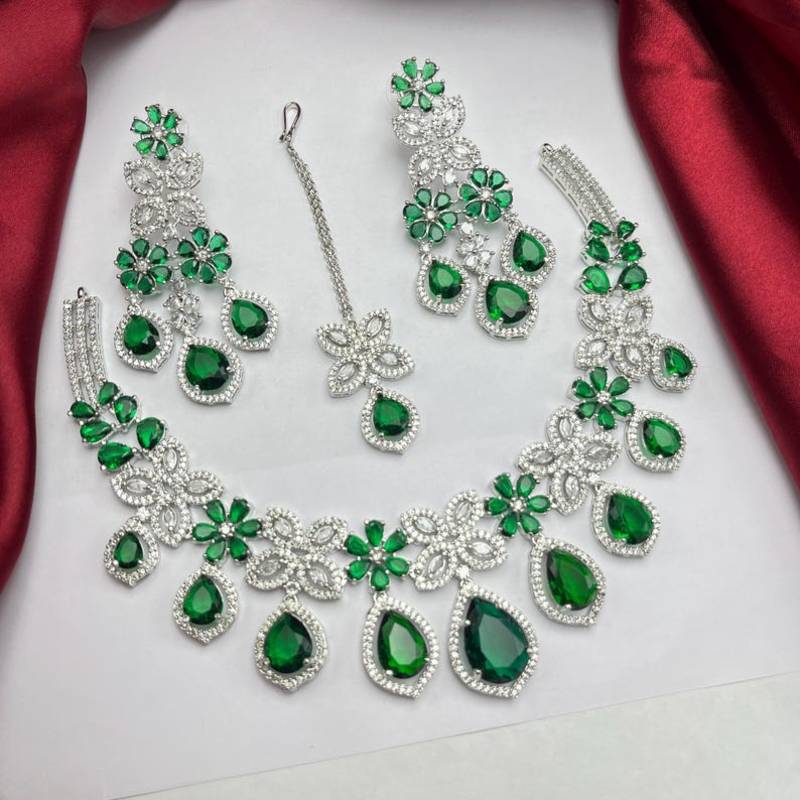 emerald green bridal jewellery set  silver toned necklace, chandelier earrings, maang tikka