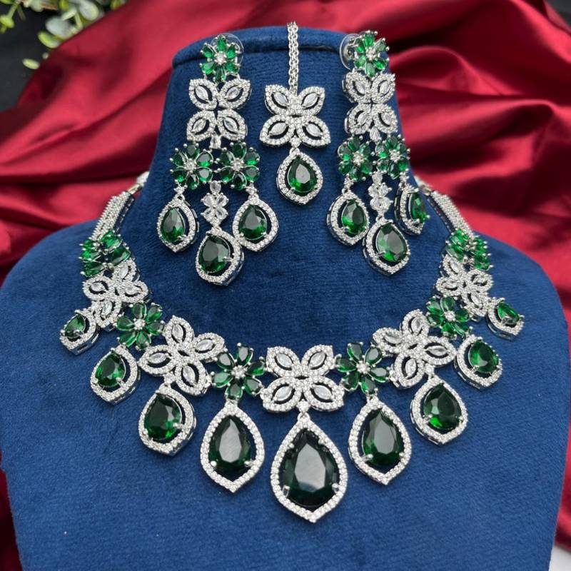 emerald green bridal jewellery set  silver toned necklace, chandelier earrings, maang tikka